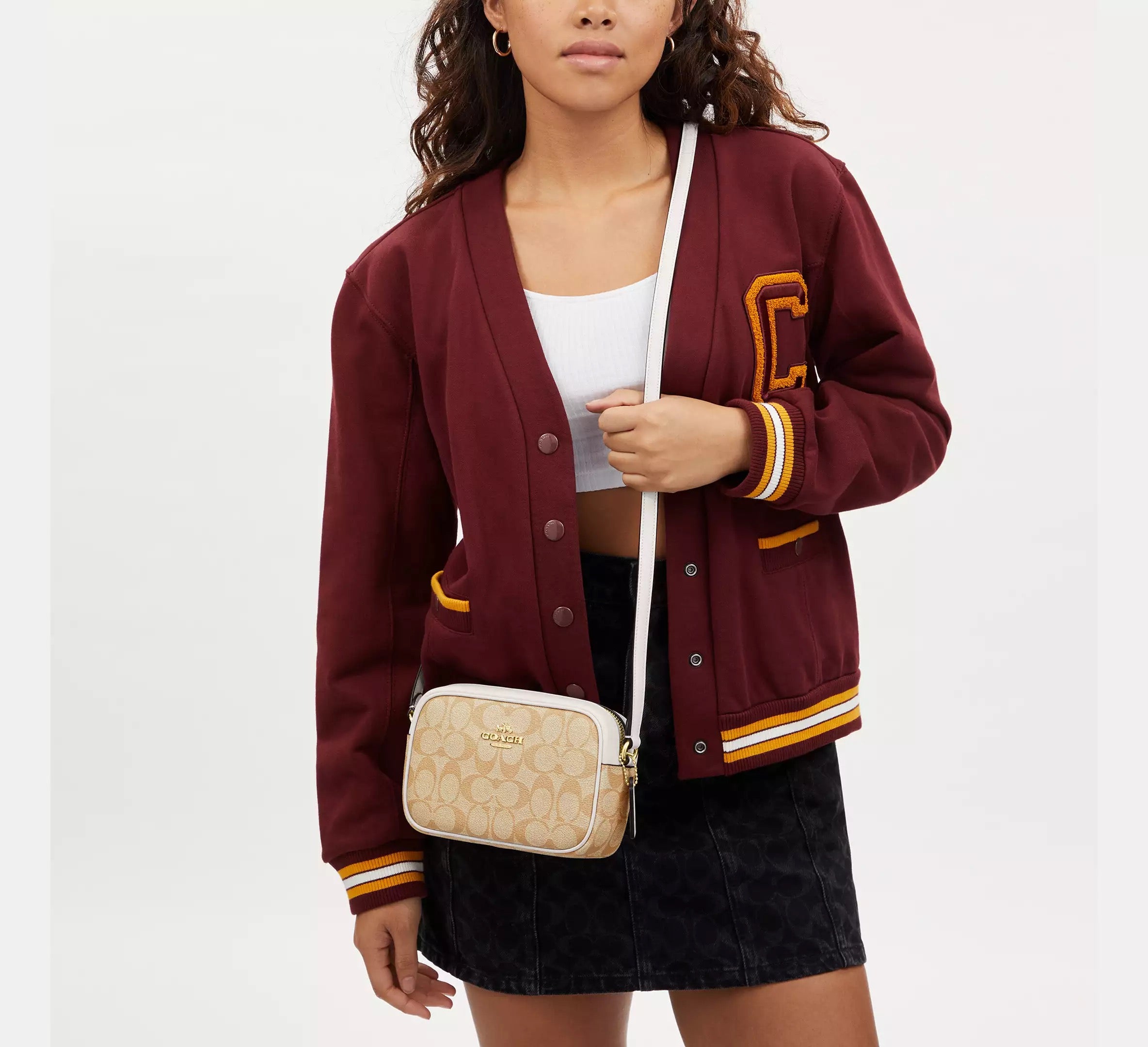 Coach Crossbody Camera con monograma