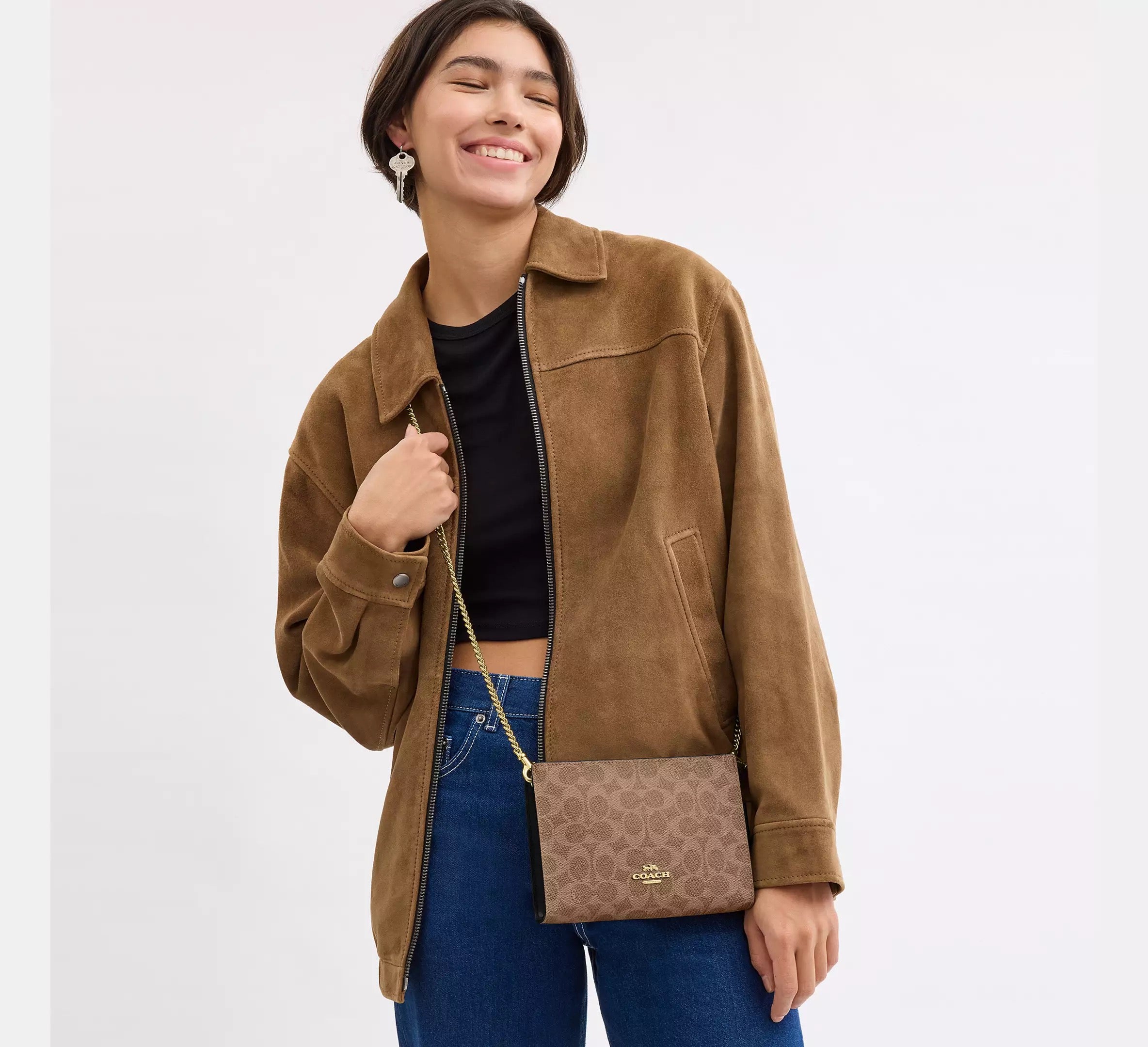 Coach Crossbody Slim con monograma