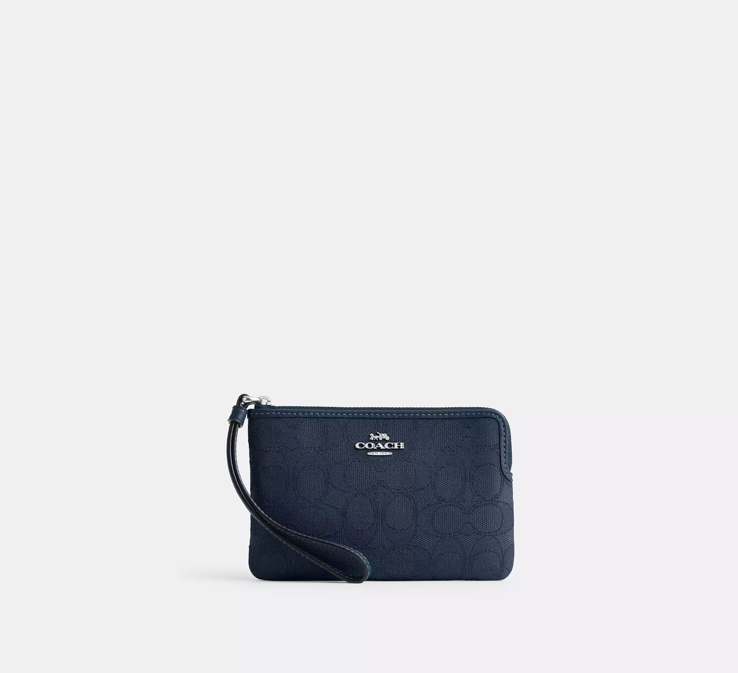 Coach Wristlet con monograma Jacquard